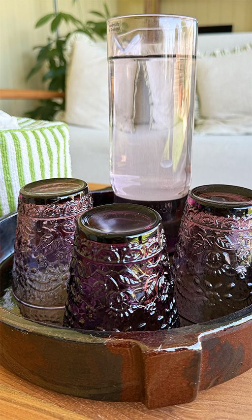 Water and glasses on a coffee table