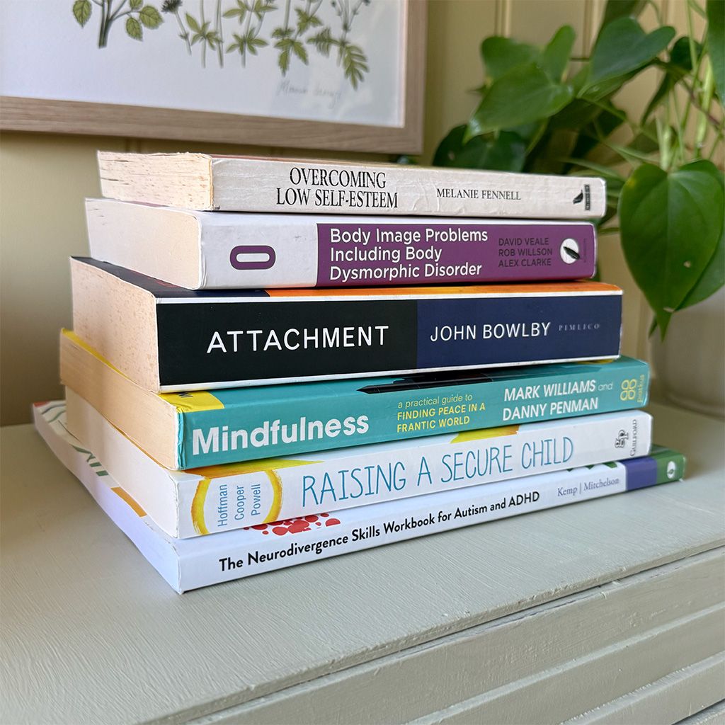 A stack of therapy books
